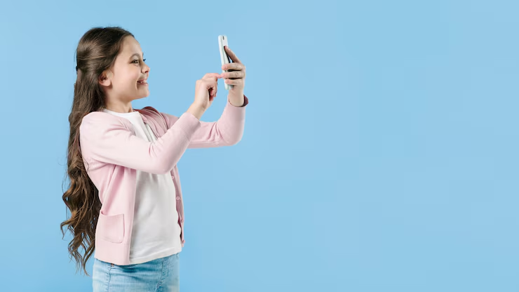 Online Learning Meets Social Media: A New Era of Education 2 kid involved in online learning using social media on phone